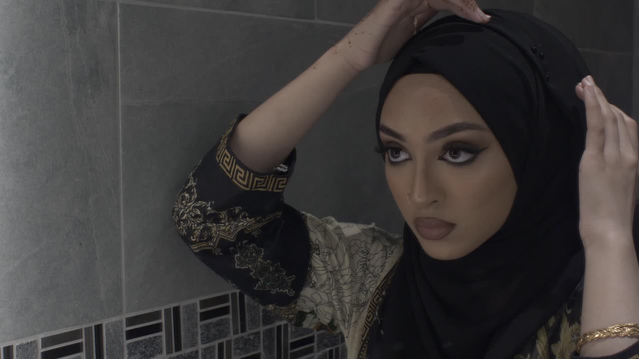 Young Muslim Woman Fixing Hijab Looking In Mirror Free Stock Video Footage  Download Clips Religion