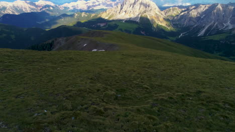 grassland meadow aerial view revealing solitary south tyrol peitlerkofel sunlit mountain peak