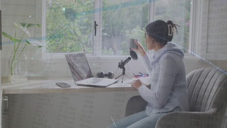 Person recording podcast at home with financial data processing animation overlay