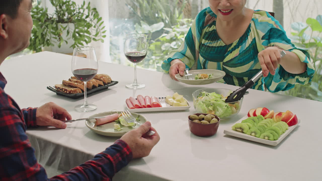 Spouses Having Romantic Dinner at Home