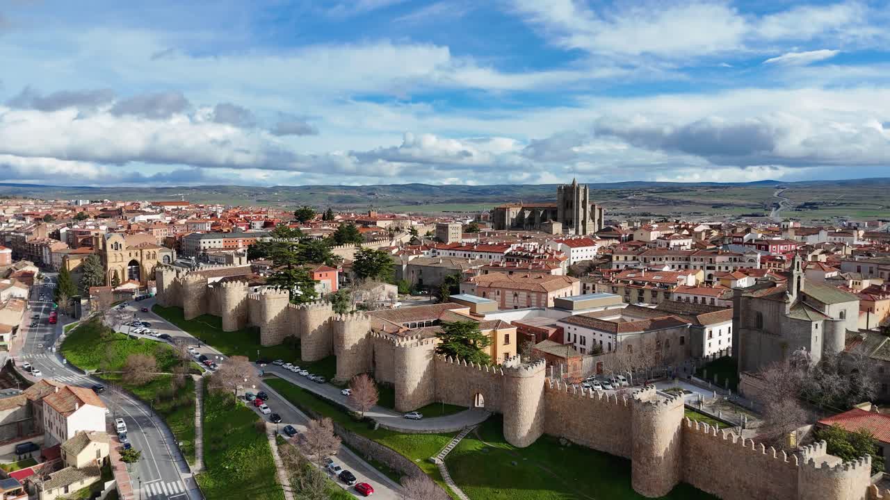 Aerial view of Ávila city showing stone walls and buildings