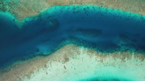 channel formed by coral reefs, north ari atoll maldives