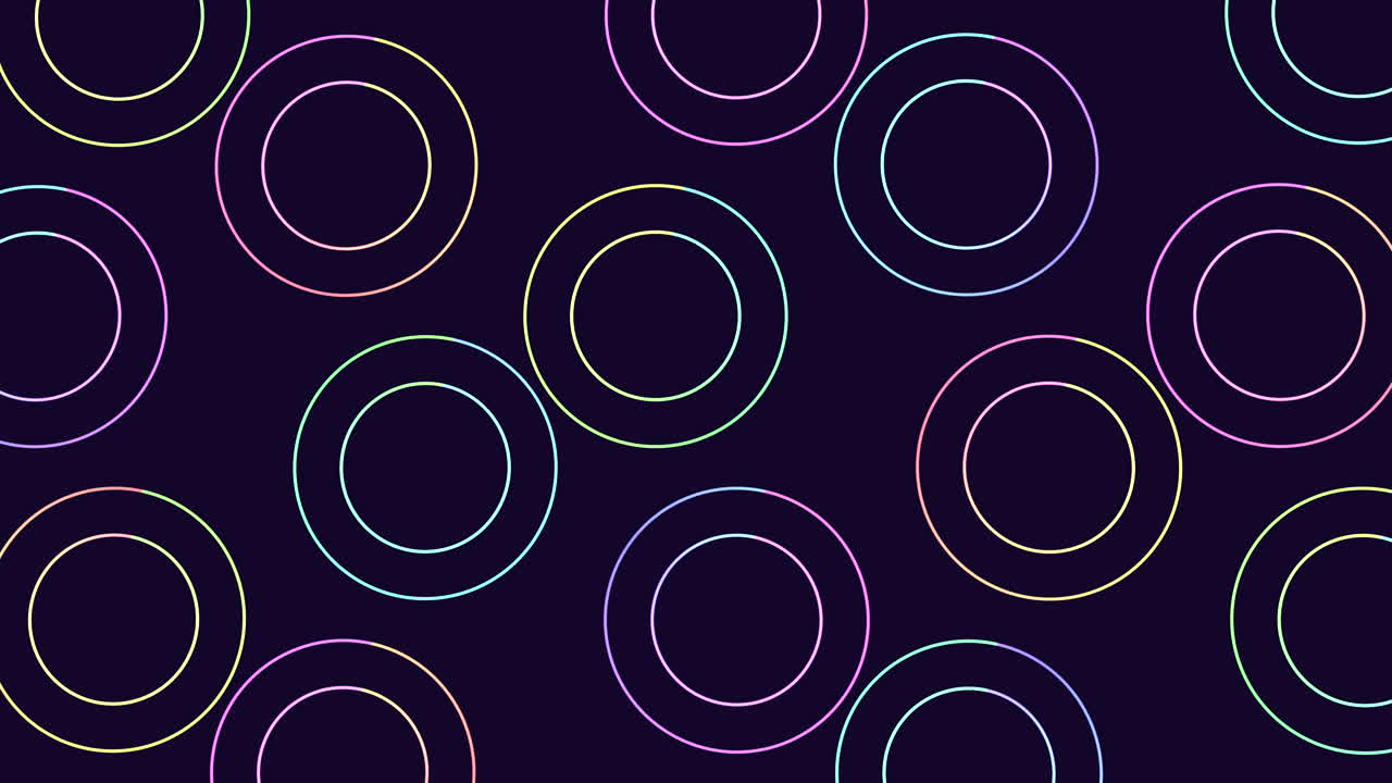 los círculos coloridos crean un patrón sin costuras en un fondo oscuro.