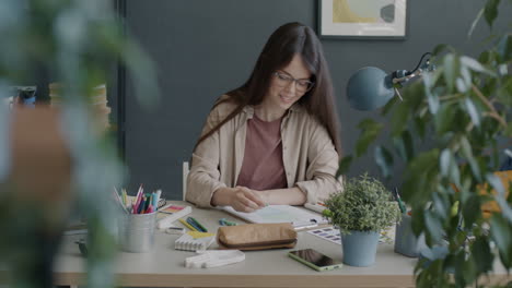 woman drawing in a home office