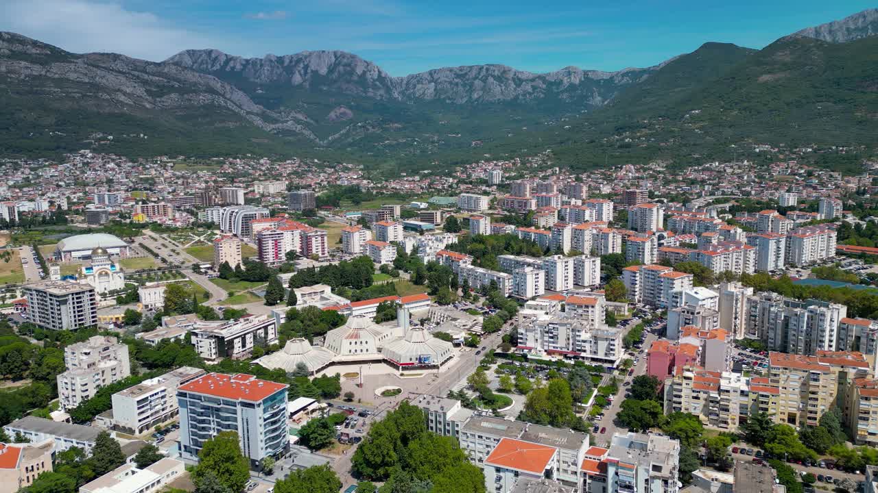 Panoramic aerial view of Kotor city. Drone going forward above the city. Mountains in Background. famous travel destination in Montenegro.
