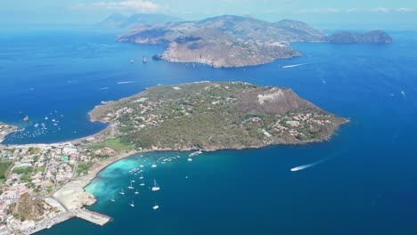 vulcano island view of volcanic aeolian islands in tyrrhenian sea, sicily, italy - aerial 4k circling