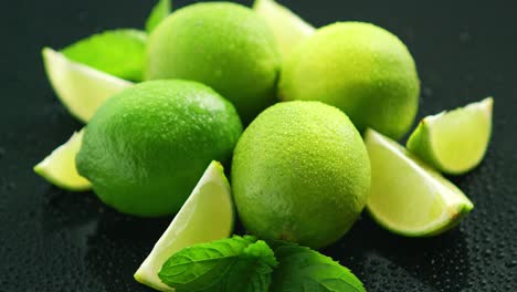Ripe-green-limes-on-table-