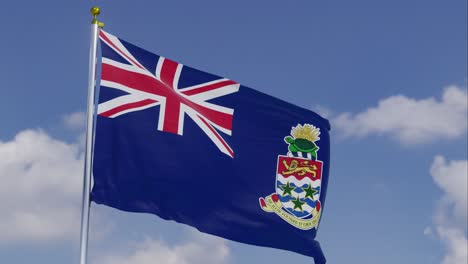 flag of cayman islands moving in the wind with a clear blue sky in the background, clouds slowly moving, flagpole, slow motion