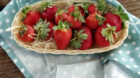 Fresh strawberries in wicker tray