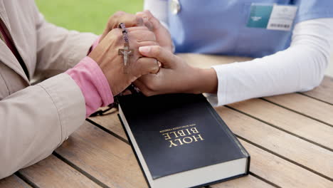 people, together and holding hands in prayer