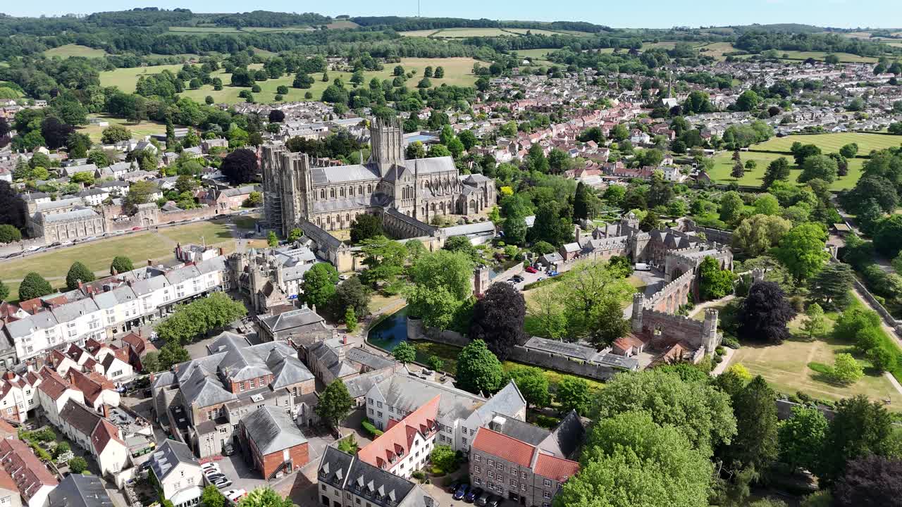 Establishing aerial shot Wells Somerset town centre summer