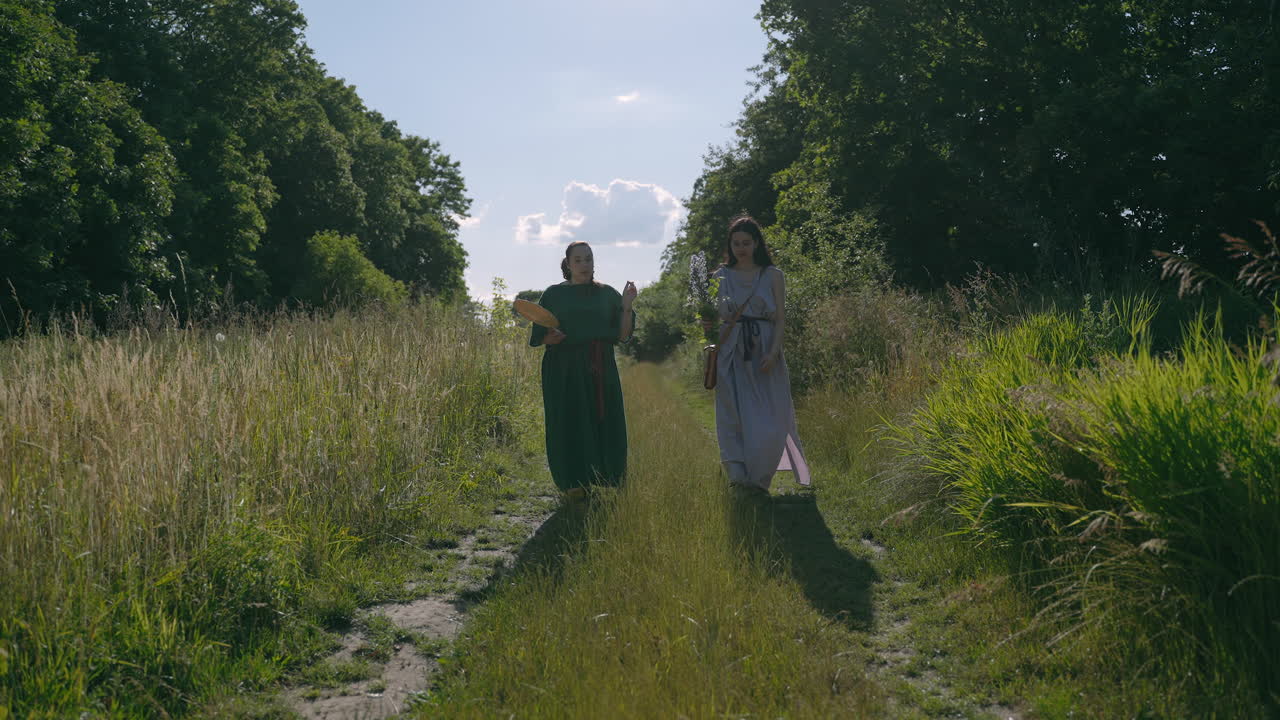 Two Women Walking a Forest Path