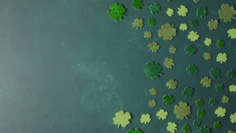 overhead studio shot of green shamrock shapes with copy space to celebrate st patricks day 1