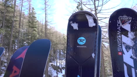 Ski-bin-outside-a-gondola-close-to-a-snowy-forest-to-climb-the-ski-slopes-of-Saas-Fee-in-the-Swiss-alps