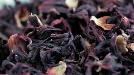 hibiscus tea, karkade. close-up. rotation food. tea of large, dry, red hibiscus flowers. herbal tea background