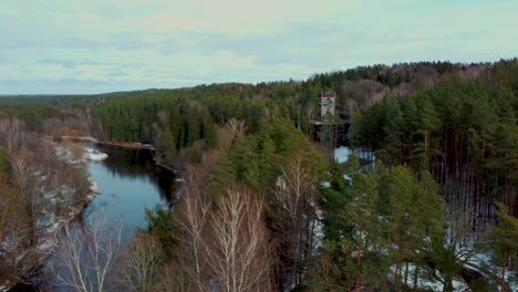 Aerial-View-of-Anyksciai-Laju-Takas,-Treetop-Walking-Path-Complex-With-a-Walkway,-an-Information-Center-and-Observation-Tower,-Located-in-Anyksciai,-Lithuania-near-Sventoji-River