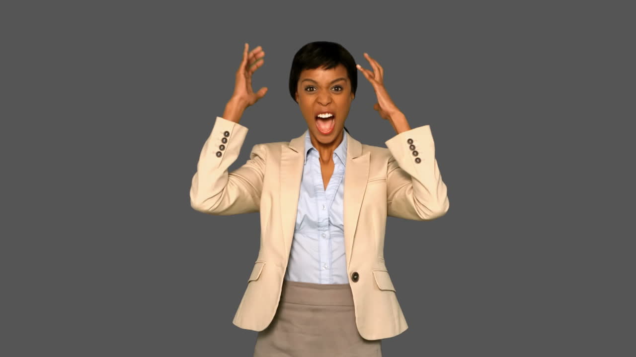 Irritated businesswoman gesturing