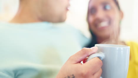 couple, hands and conversation with coffee in home