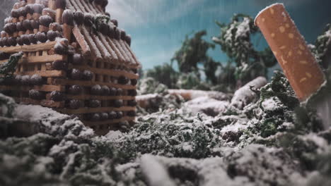 stage with house model of matches near stubs at snowfall