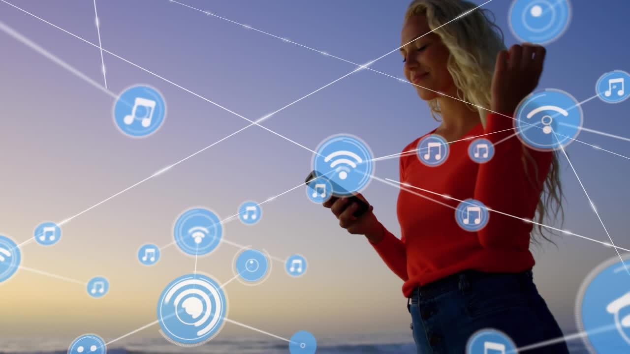 red de iconos digitales contra caucásicos que usan teléfonos inteligentes en la playa