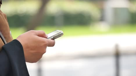 a woman using her smartphone