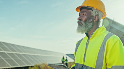 Man,-tablet-and-thinking-of-solar-panels