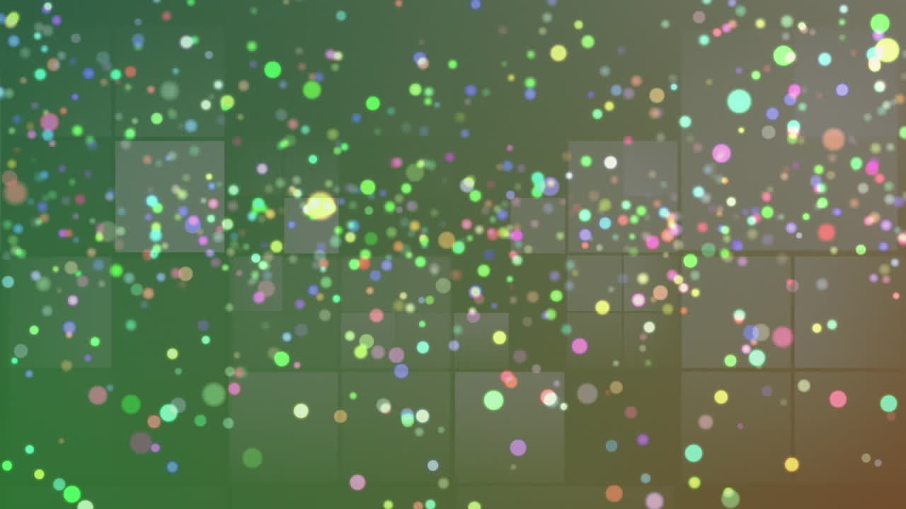 검은 바탕에 반 ⁇ 이는 빛의 사각형 위에 떠다니는 색 ⁇ 의 크리스마스 불빛의 애니메이션