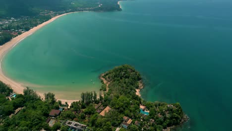 4K-Cinematic-nature-drone-footage-of-a-panoramic-aerial-view-of-the-beautiful-beaches-and-mountains-on-the-island-of-Koh-Lanta-in-Krabi,-South-Thailand,on-a-sunny-day