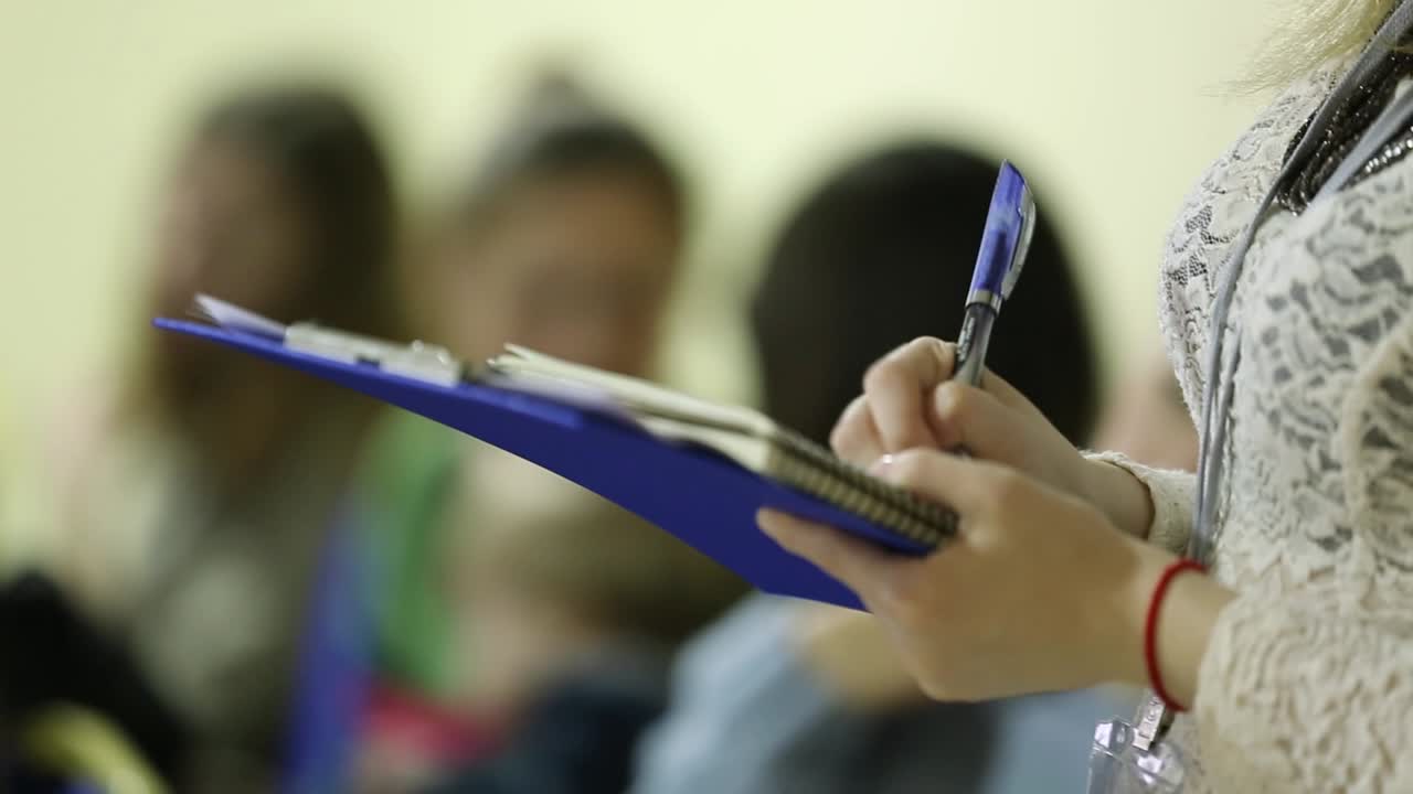 Working At A Business Conference. Conference meeting, hands, pen, notebooks and writing