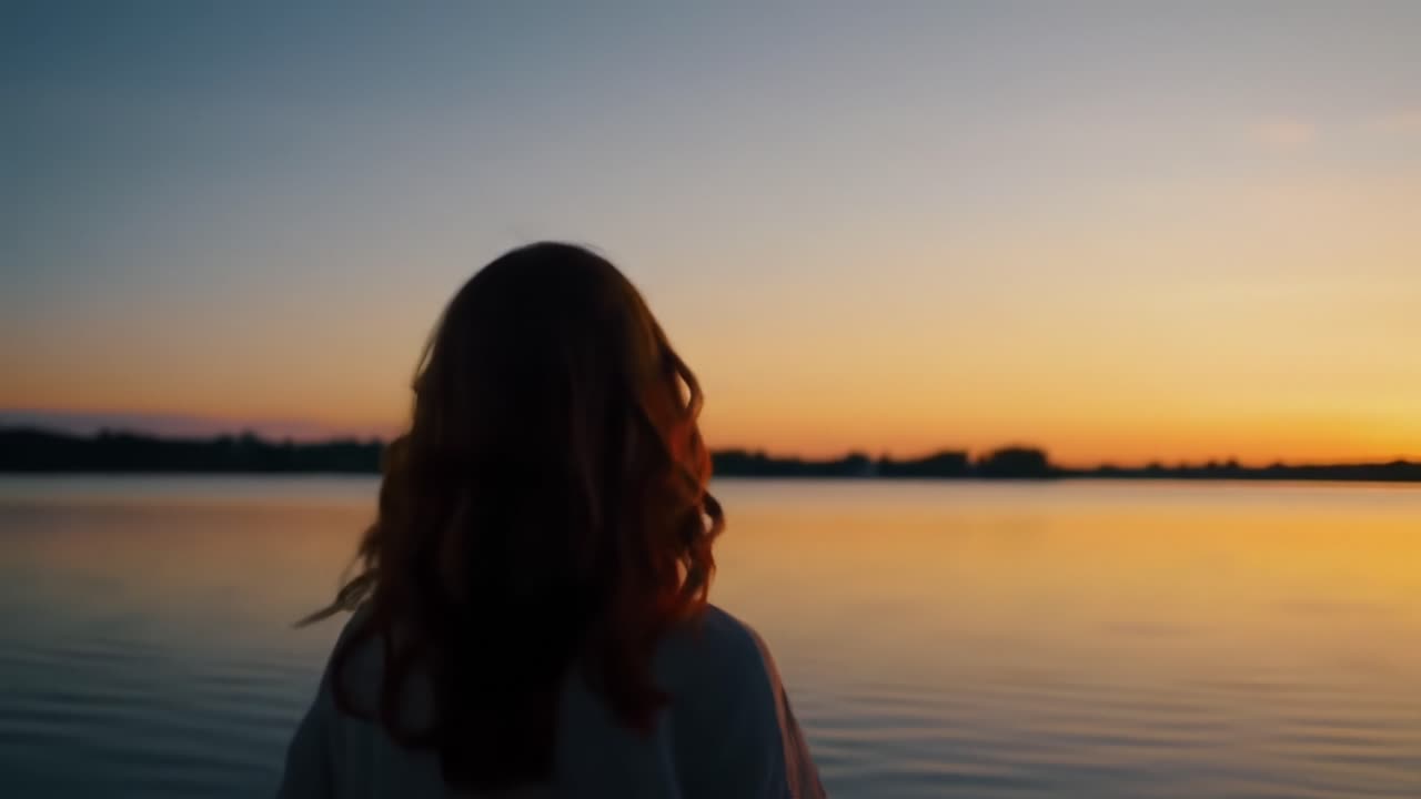 A Serene Journey Spanning Time: Capturing a Soulful Moment of Reflection at Sunset by the Water's Edge, Bathing in Golden Hues and Enveloping Peace