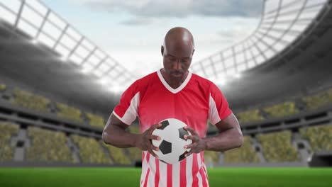 animation of stadium over african american male soccer player