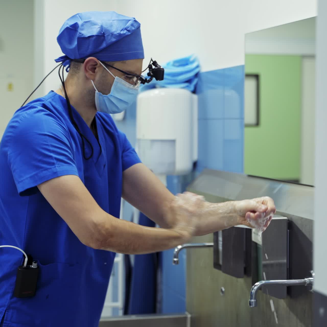 Doctor washing hands. Surgeon washing hands before operating