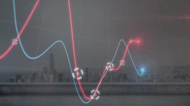 Animation of glowing graphs moving over grid network against aerial view of cityscape