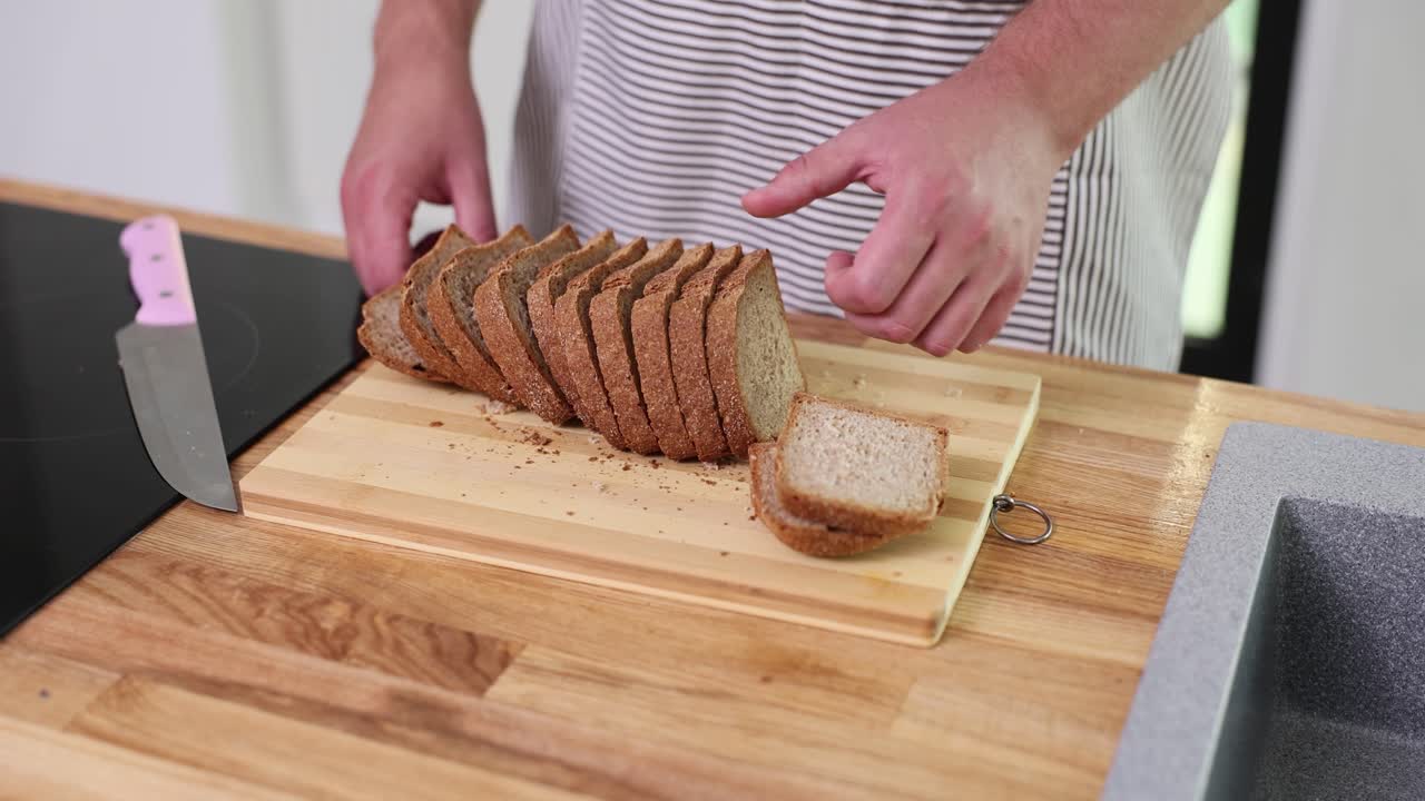 Slicing bread in the kitchen