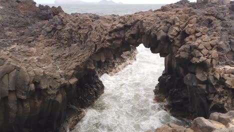 panoramic shot of one of the caletones arches located on the island of la graciosa