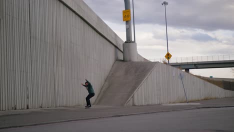 man does a trick into a ramp