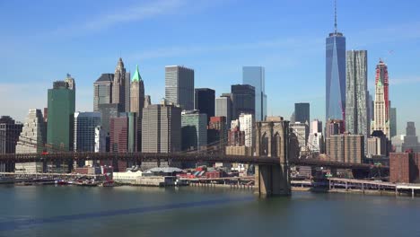 nice establishing shot of new york city financial district with brooklyn bridge foreground 2