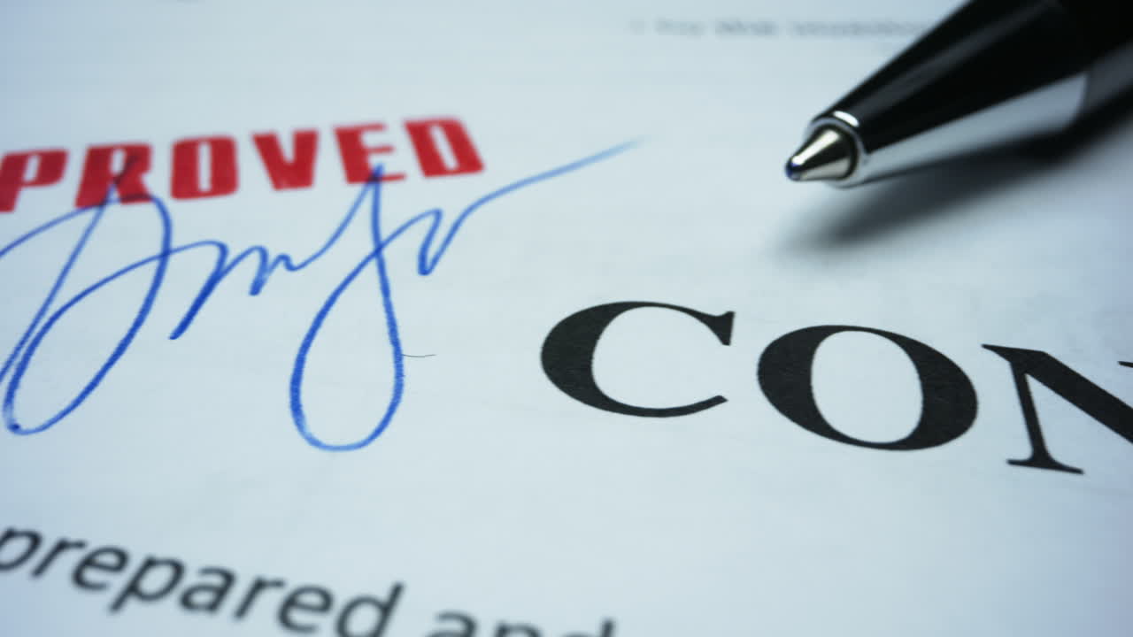 Contract in english language. Business contract marked with approved stamp