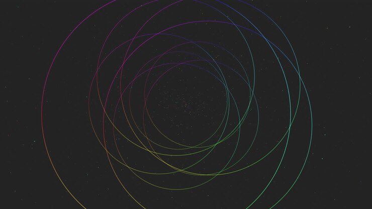 Astratto di cerchi concentrici multicolori che orbitano su uno sfondo stellato scuro, creando un effetto tunnel cosmico futuristico ideale per progetti di tecnologia, scienza, visual musicali e motion design.