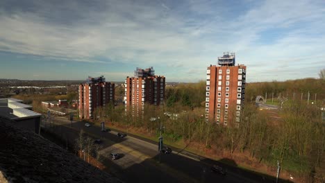 High-rise-tower-blocks,-flats-built-in-the-city-of-Stoke-on-Trent-to-accommodate-the-increasing-population,-housing-crisis-and-over-crowding,-immigration-housing