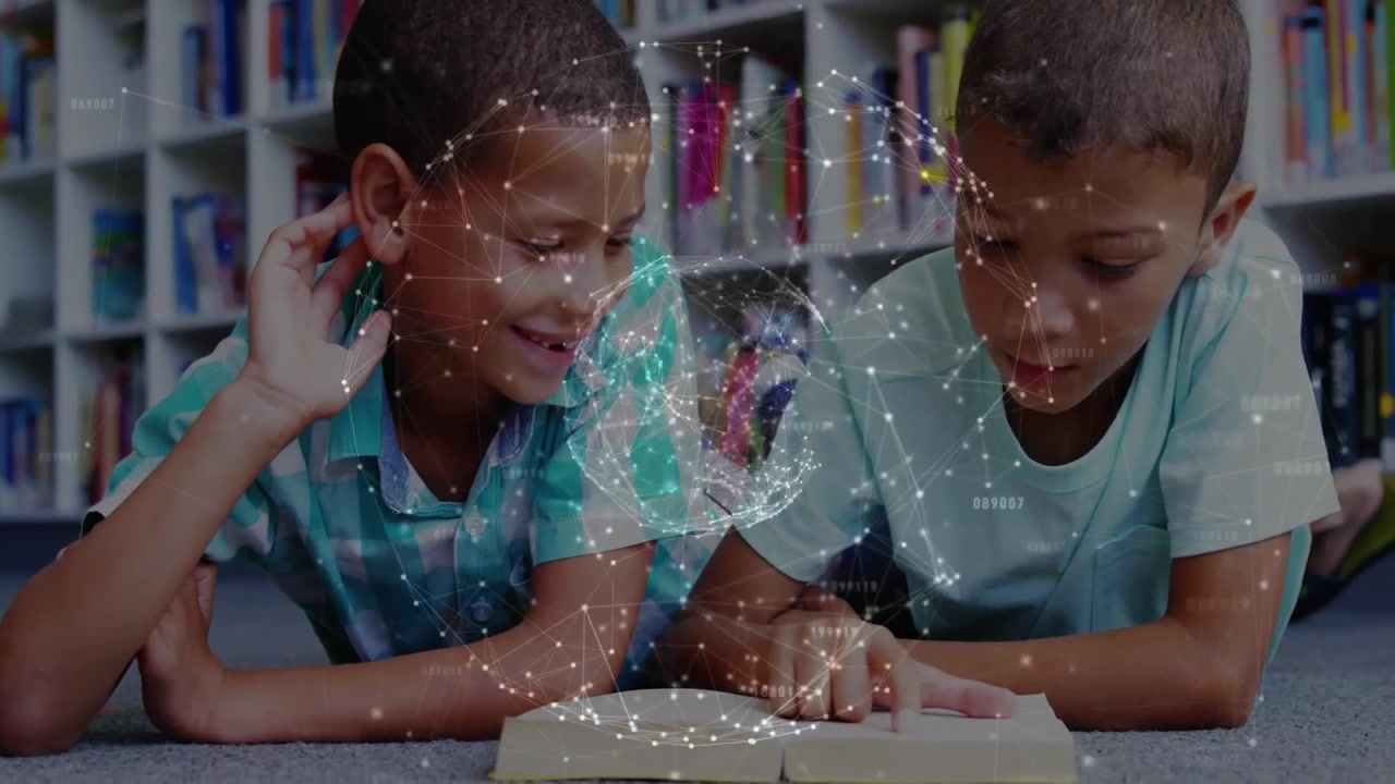 Two Young Boys Reading a Book in a Library with Digital Globe Overlay