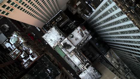 ice chunks falling down the buildings in chicago - top down aerial