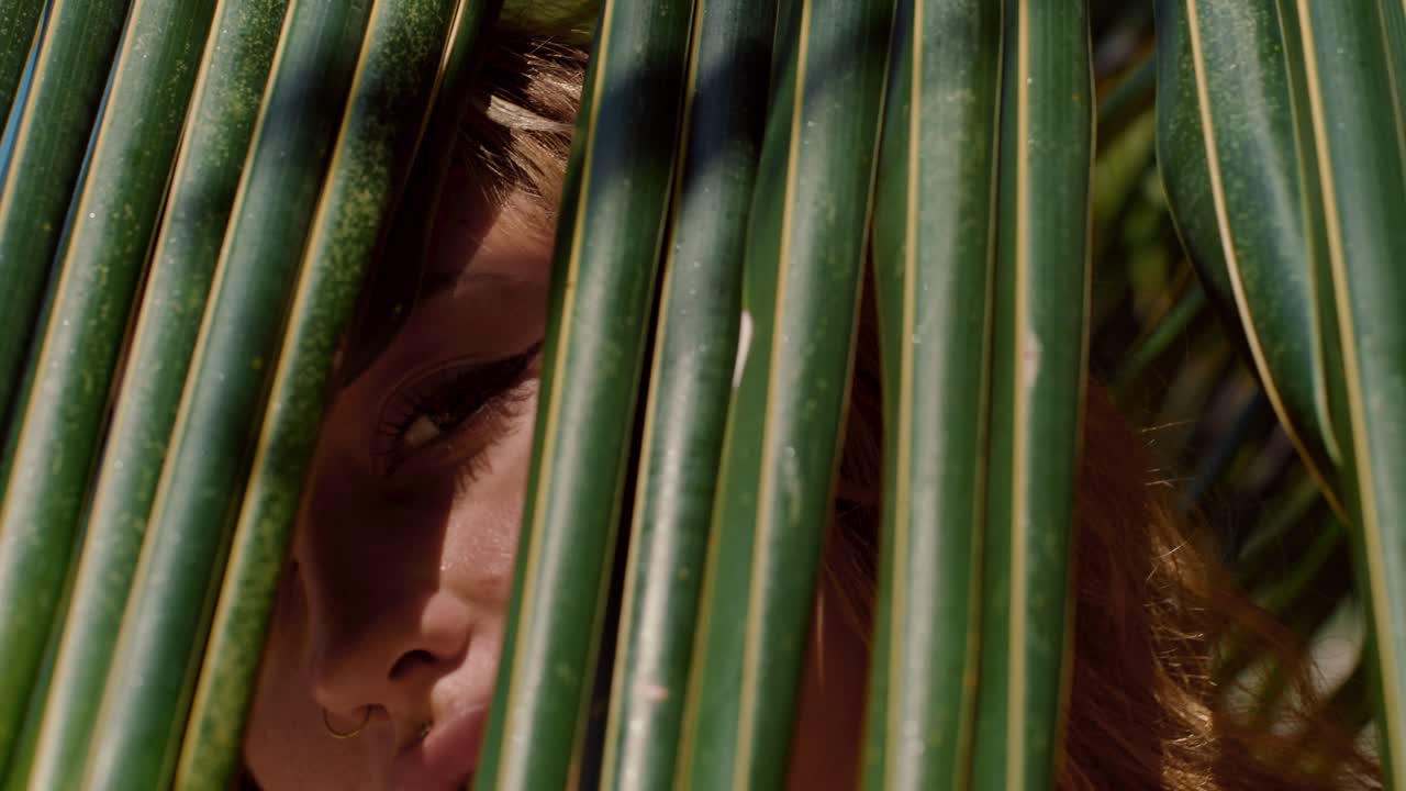 Woman in Palm Leaves