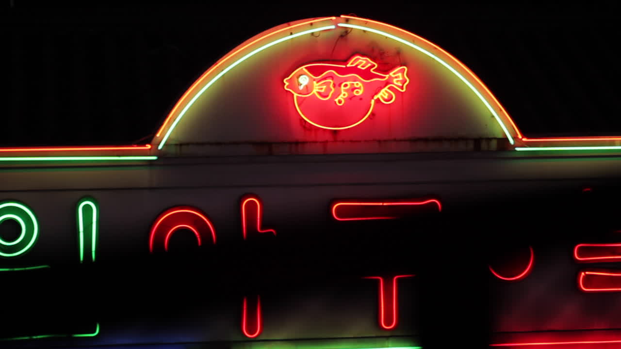 Neon Sign of a Korean Fugu Restaurant at Night