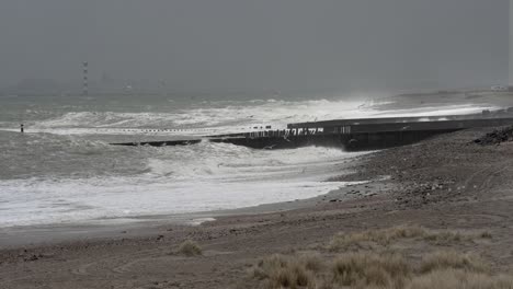 stormy seas and coastal landscape