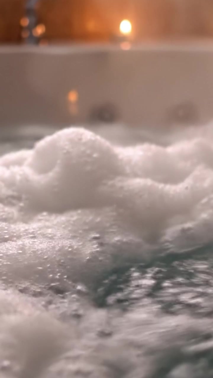 Lush, Relaxing Bath Experience: Immerse Yourself in the Serenity of Soft Bubbles and Calm Waters, Perfect for a Spa-like Getaway at Home