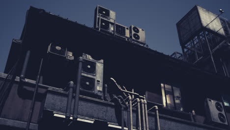 urban building with multiple air conditioning units on rooftop during daytime