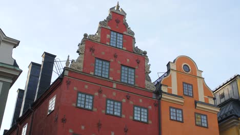 unique and colorful structures in gamla stan, stockholm, sweden - panning shot