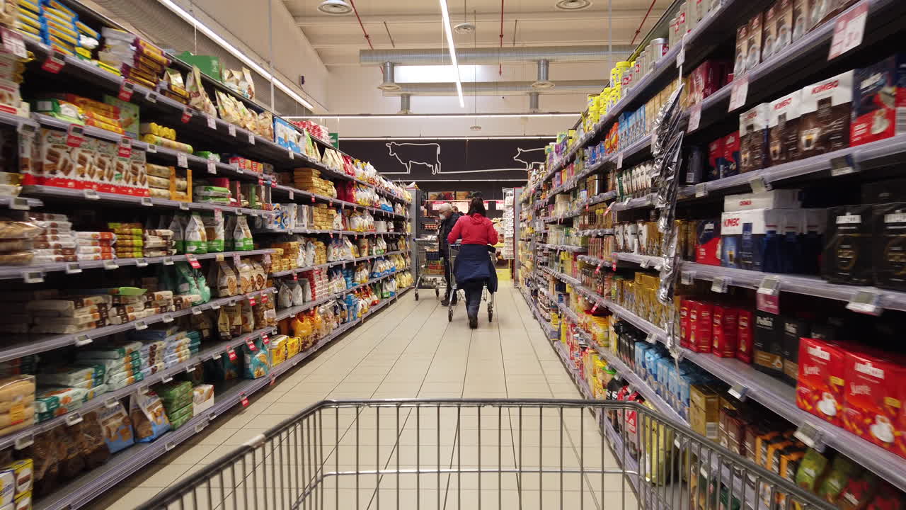 People shopping with a mask during the Coronavirus lockdown in Italy