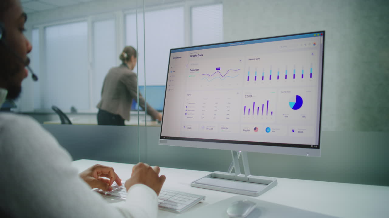 Customer Service Representatives Working in Modern Office